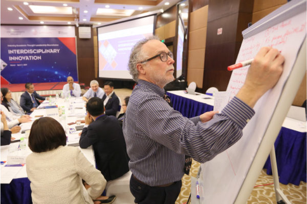 Gary Thompson with flipchart-Academic Consulting Project