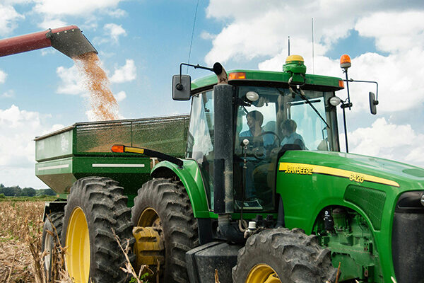 Agricultural machinery in field during harvest